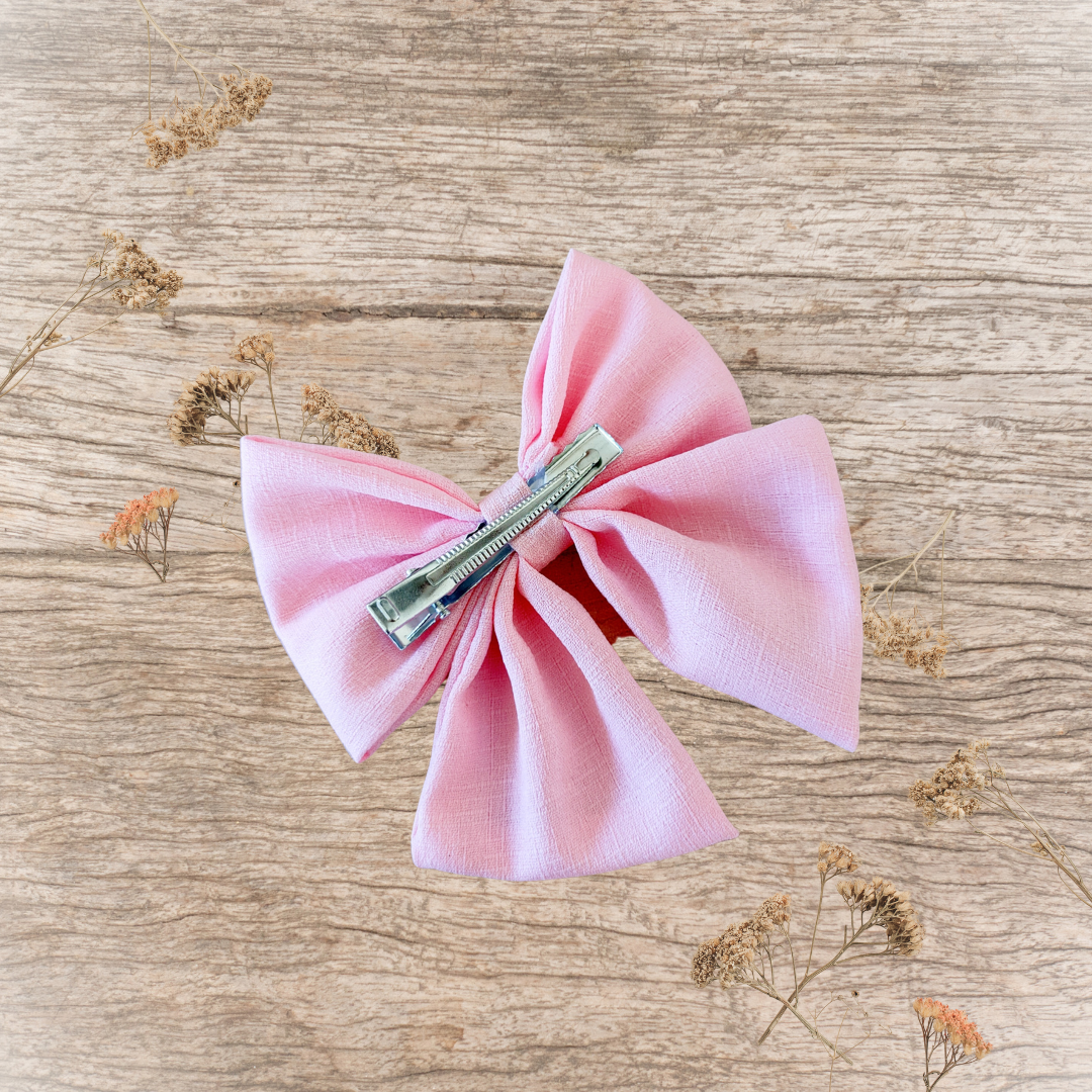 Barrette grand nœud ruban rose bonbon