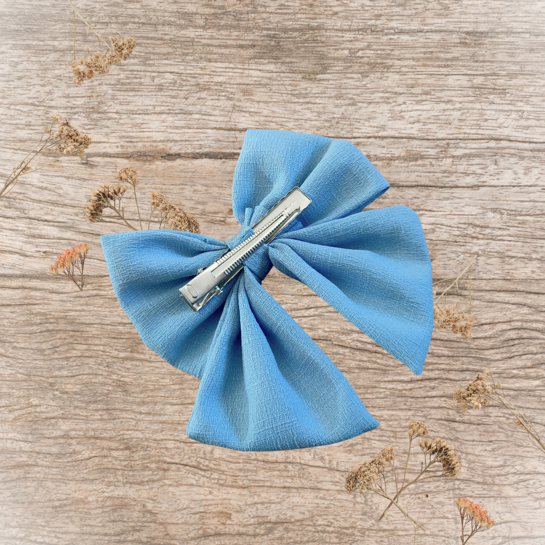 Barrette grand nœud ruban bleu