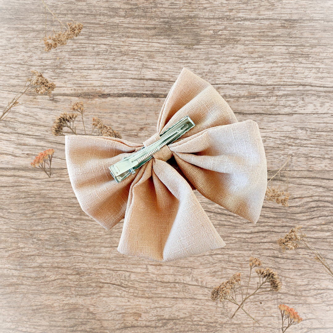 Barrette grand nœud ruban nude