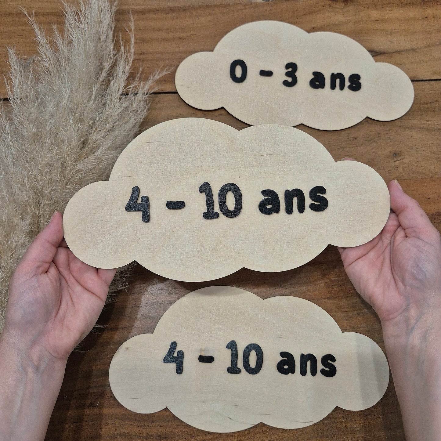 Pancartes sur-mesure pour boutique de vêtements enfants