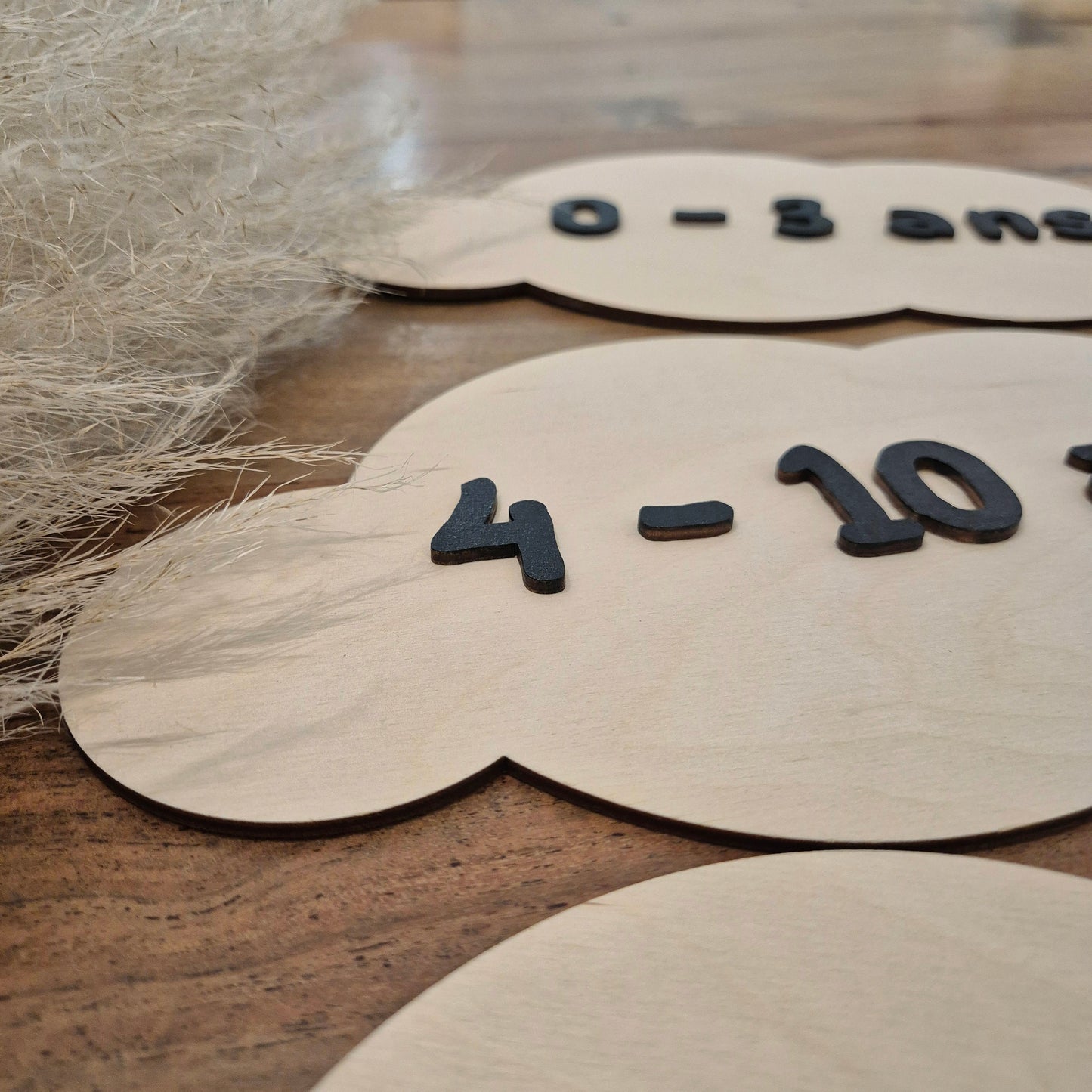 Pancartes sur-mesure pour boutique de vêtements enfants