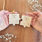 Duo de porte-clés en bois personnalisés - Puzzle calendrier