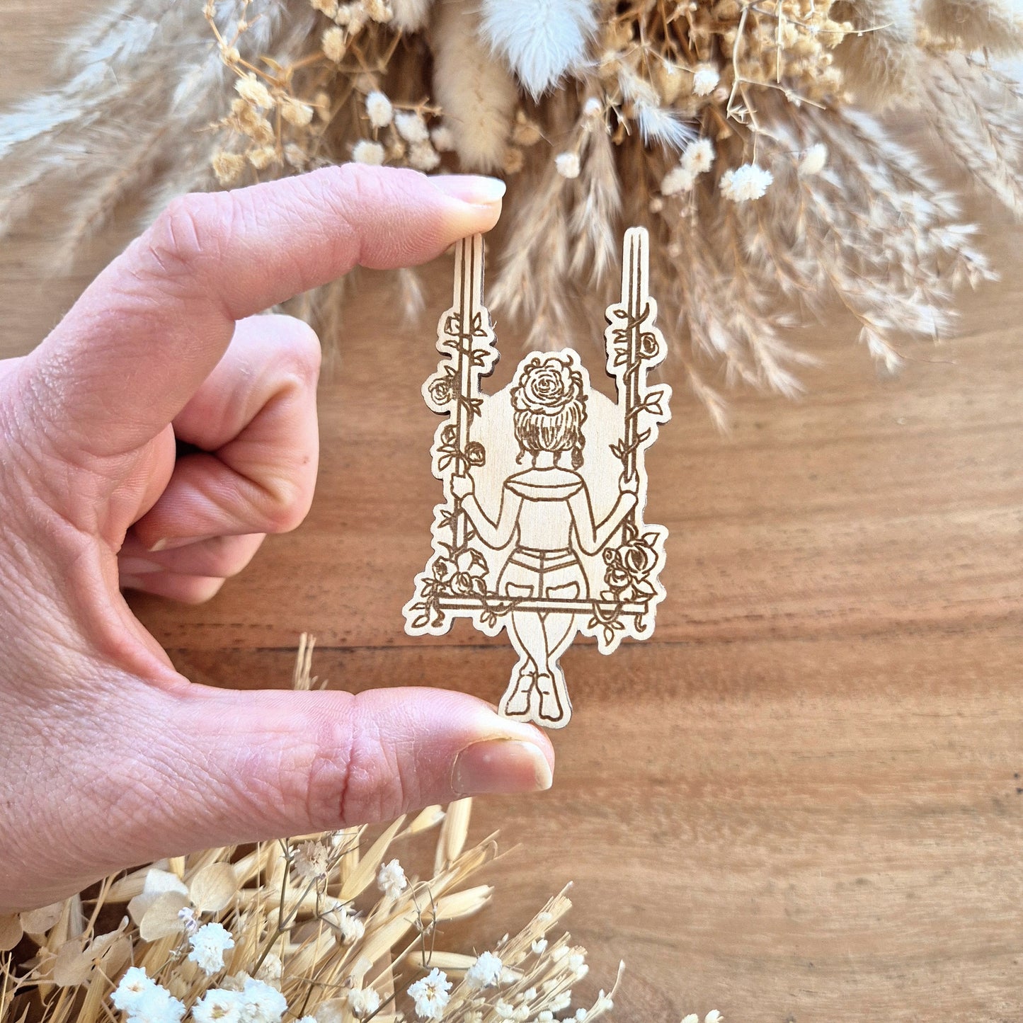 Magnet femme balançoire poétique