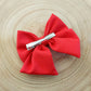 Barrette grand nœud ruban rouge