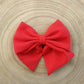 Barrette grand nœud ruban rouge